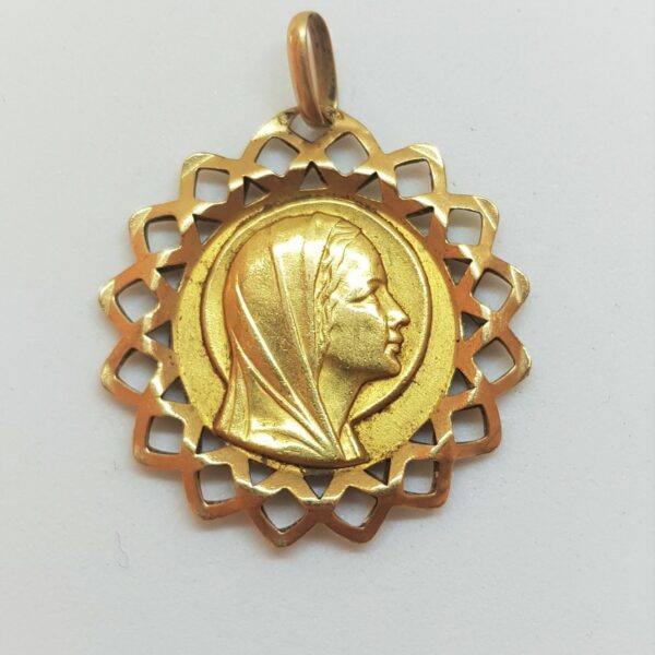 VENDUE. Médaille ajourée