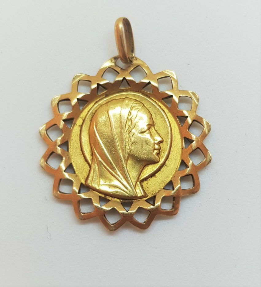 VENDUE. Médaille ajourée