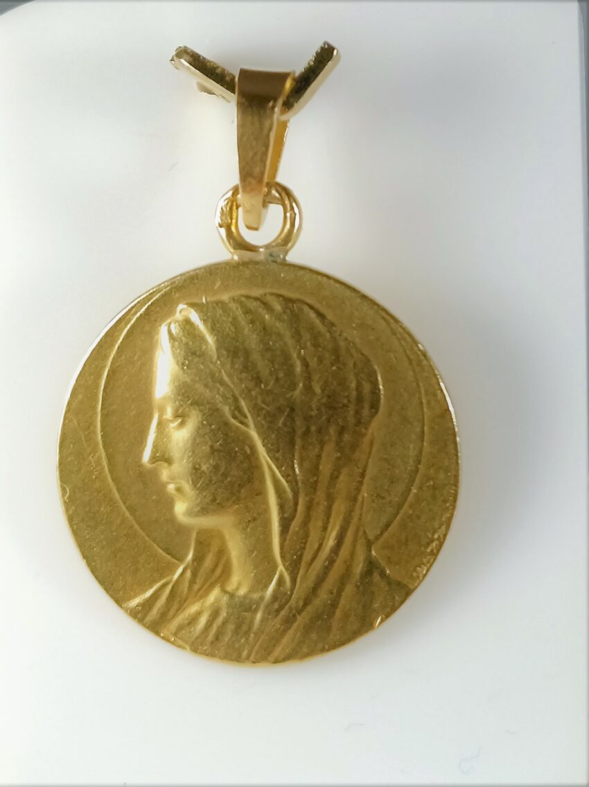 Vendue. Médaille en or