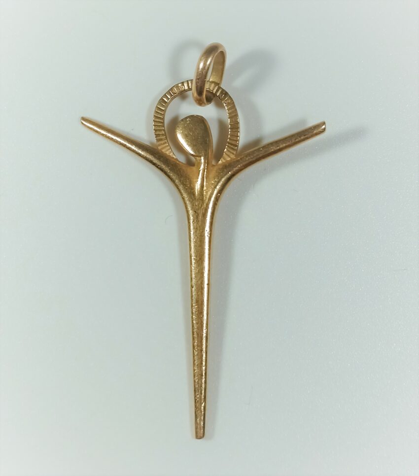 Originale croix en or
