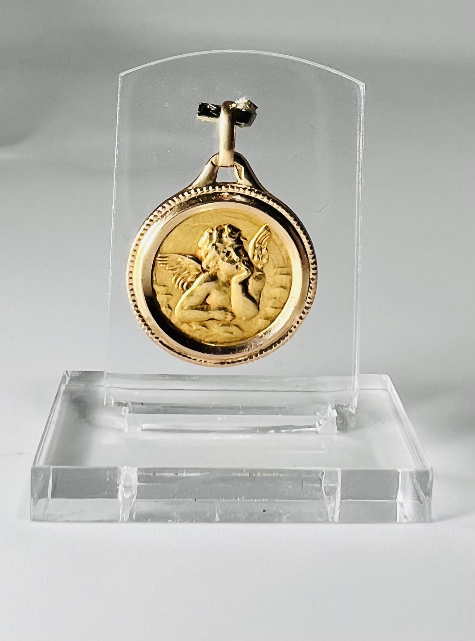 Médaille ange en or, double entourage