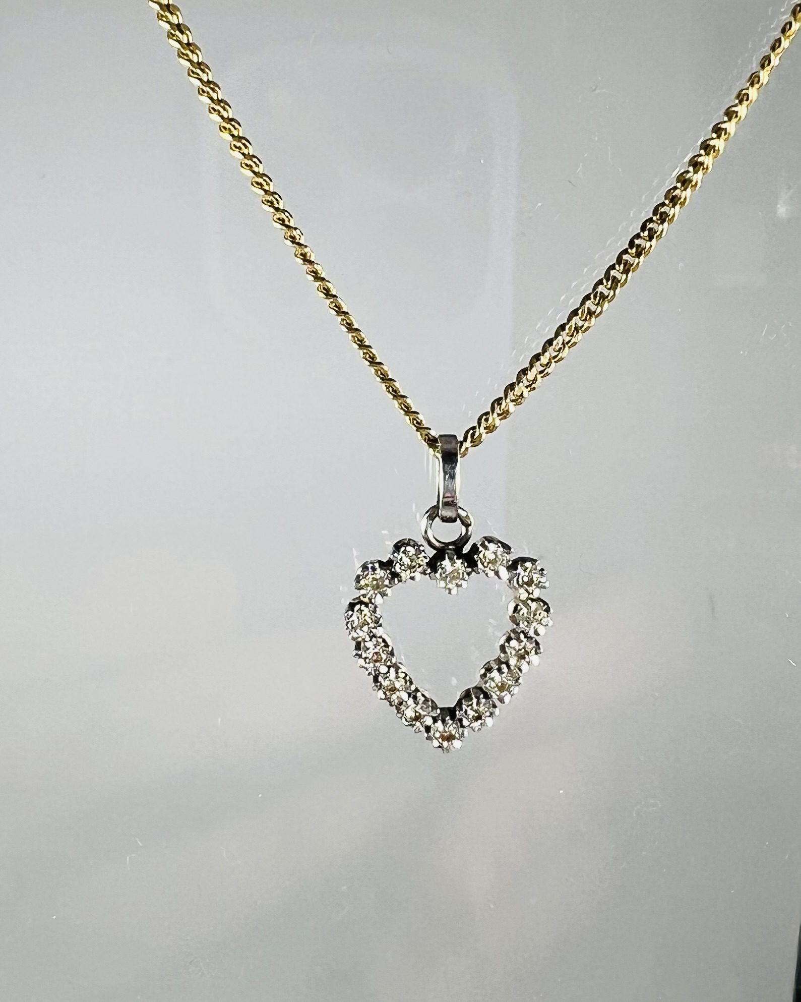 Pendentif coeur or blanc et diamants